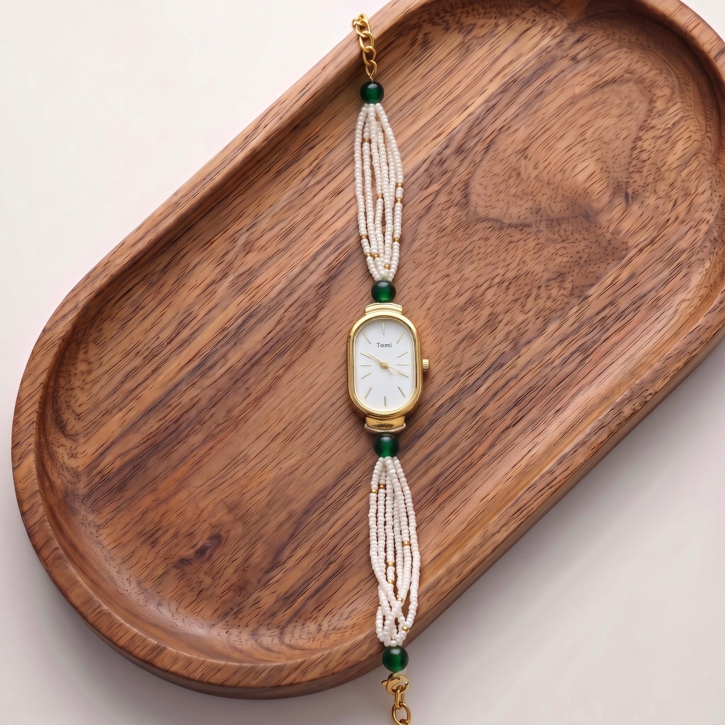 Green oval moti watch