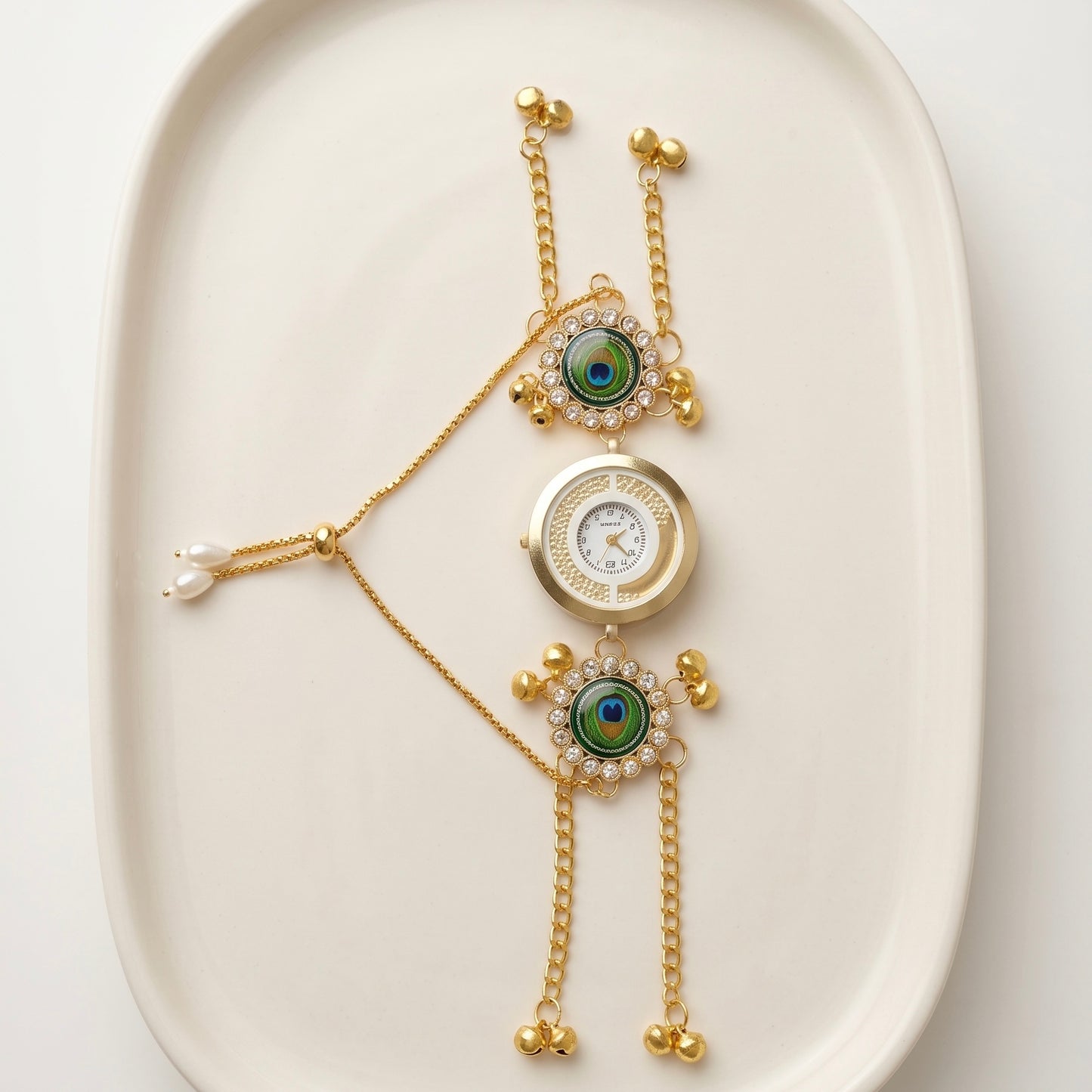 Round peacock dial watch
