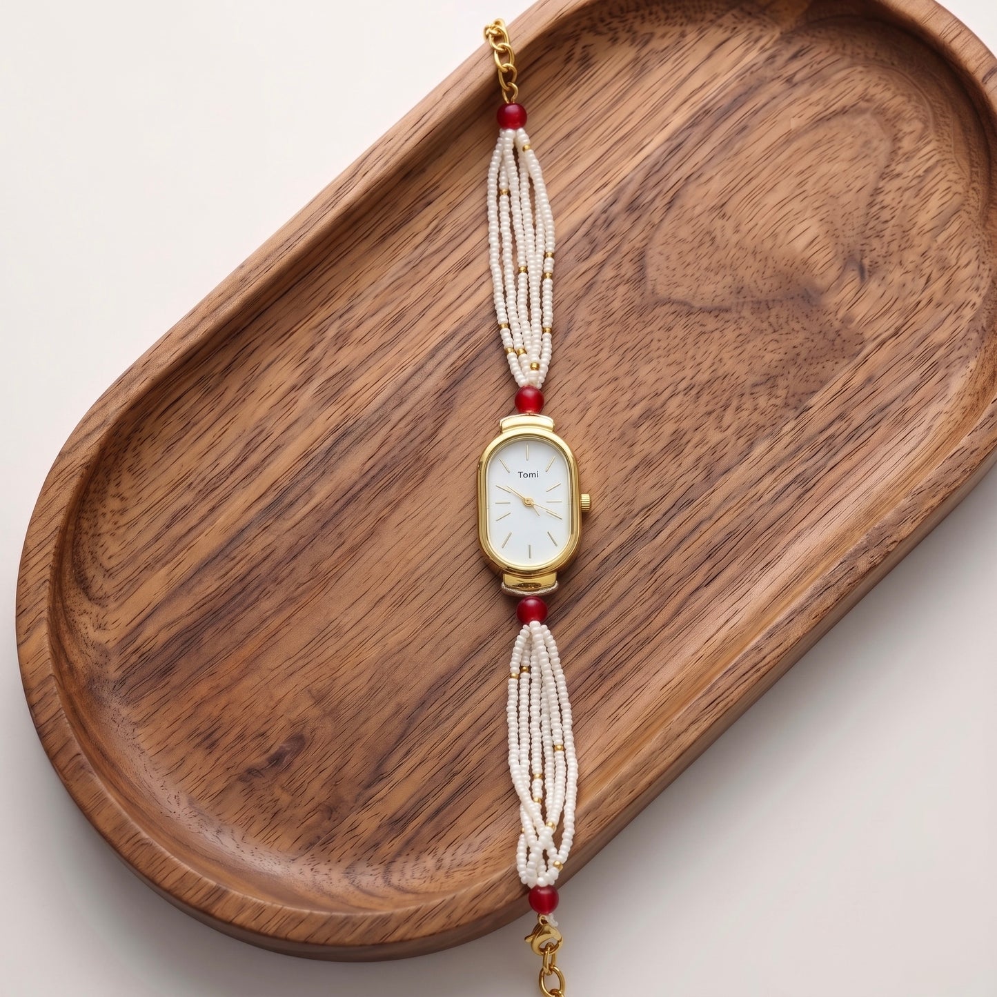 Red oval moti watch